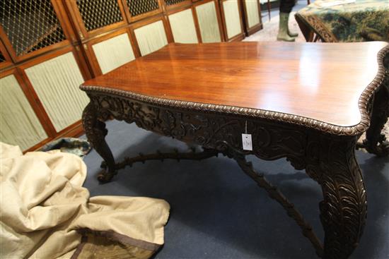 A 19th century Burmese hardwood centre or library table, W.5ft 10in. D.3ft 8in. H.2ft 6in.